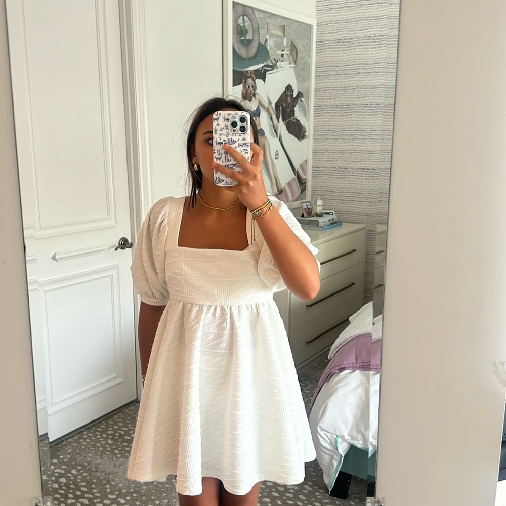Free people white baby doll dress in size extra small